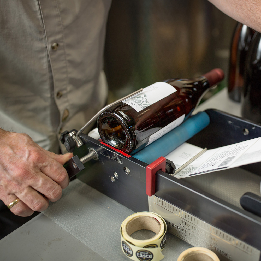labeling wine at wine tour